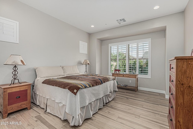bedroom featuring recessed lighting, baseboards, visible vents, and light wood-style floors