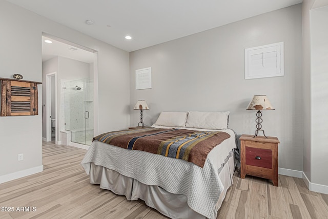 bedroom featuring baseboards, recessed lighting, light wood-style flooring, and connected bathroom