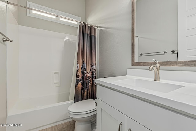 bathroom featuring vanity, wood finished floors, shower / bath combination with curtain, and toilet