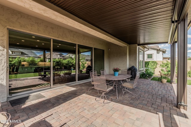 view of patio with outdoor dining area
