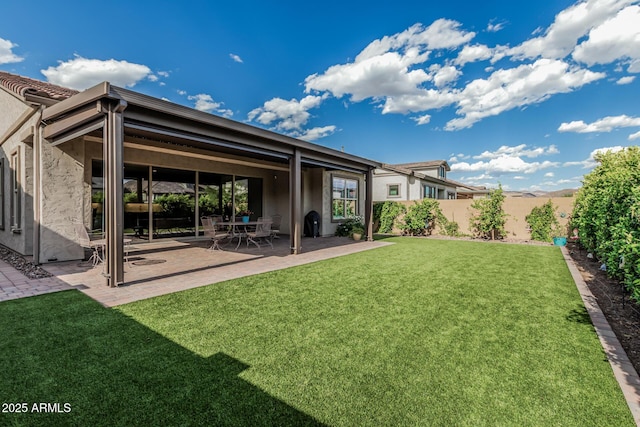 view of yard with a patio and a fenced backyard