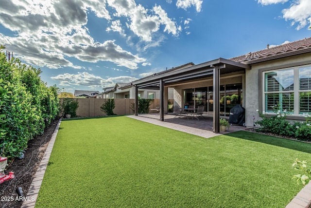 view of yard featuring a fenced backyard and a patio area
