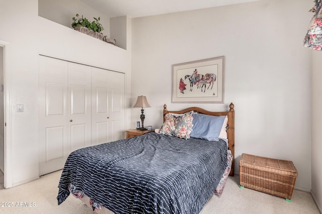 bedroom with a closet and carpet floors