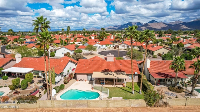 birds eye view of property featuring a mountain view and a residential view