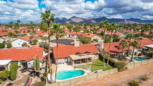 aerial view featuring a mountain view and a residential view