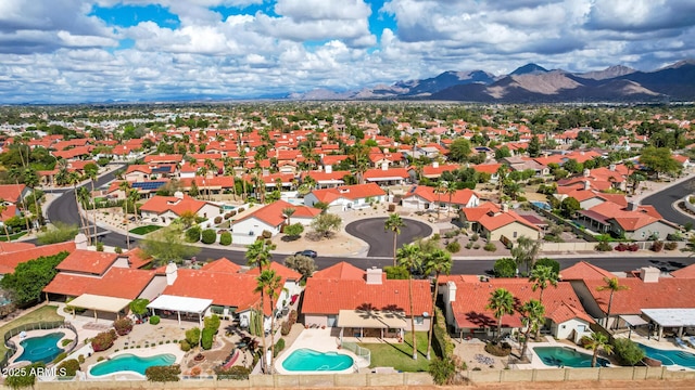 birds eye view of property featuring a residential view and a mountain view