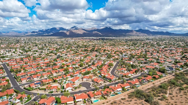 drone / aerial view featuring a mountain view and a residential view