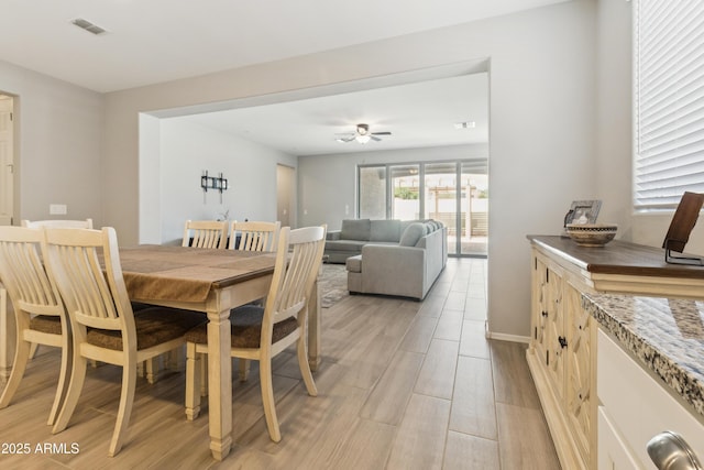 25876 N 162nd Dr, Surprise, AZ 85387 - dining area featuring light wood-style floors and ceiling fan