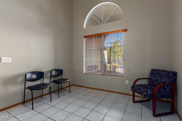 sitting room with light tile patterned floors