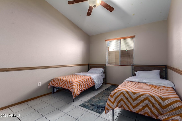 bedroom with light tile patterned floors, ceiling fan, and lofted ceiling