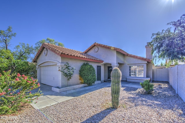 522 W Dennis Ct, Tempe, AZ 85283 - mediterranean / spanish-style house featuring a chimney, a garage, a tile roof, and stucco siding