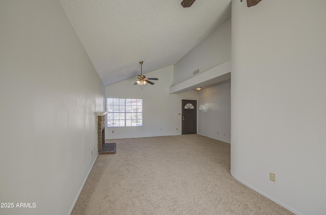 522 W Dennis Ct, Tempe, AZ 85283 - unfurnished living room with a ceiling fan, carpet flooring, high vaulted ceiling, a textured ceiling, and a brick fireplace