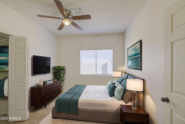 522 W Dennis Ct, Tempe, AZ 85283 - bedroom with light carpet and a ceiling fan