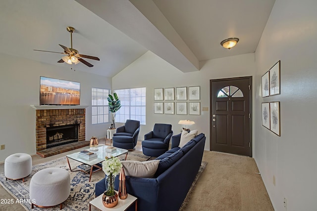 522 W Dennis Ct, Tempe, AZ 85283 - carpeted living area featuring healthy amount of natural light, a ceiling fan, a fireplace, and vaulted ceiling