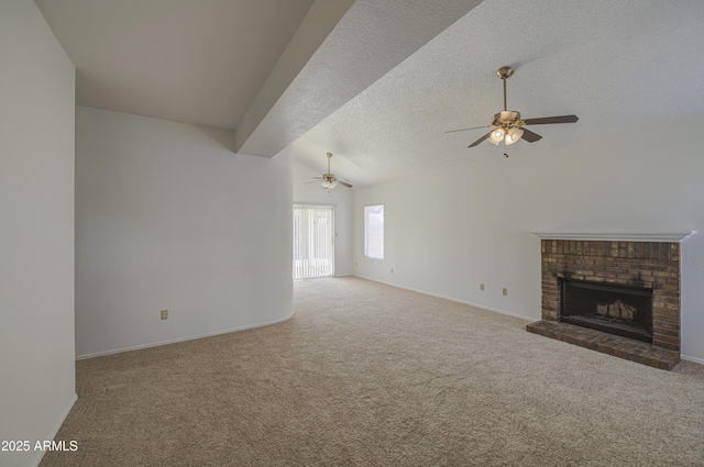 522 W Dennis Ct, Tempe, AZ 85283 - unfurnished living room featuring a ceiling fan, carpet flooring, a fireplace, a textured ceiling, and vaulted ceiling