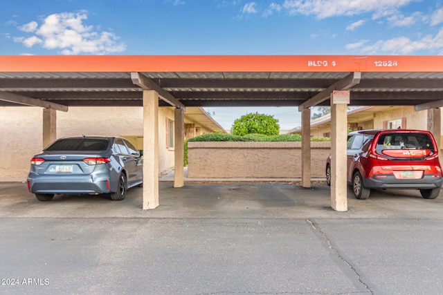 view of car parking featuring a carport