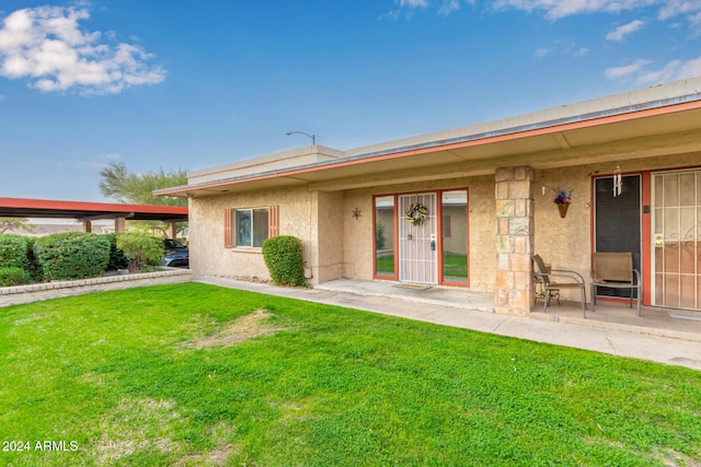 exterior space with a front yard