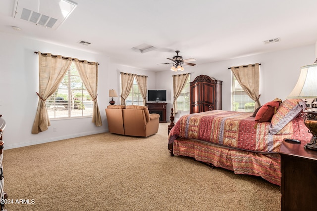 bedroom with ceiling fan and carpet floors