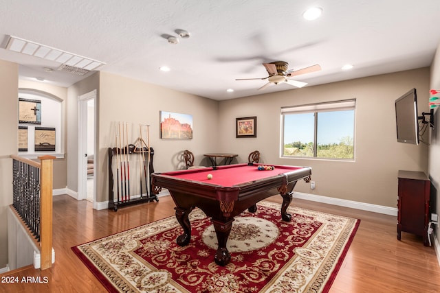 rec room with ceiling fan, hardwood / wood-style floors, and pool table