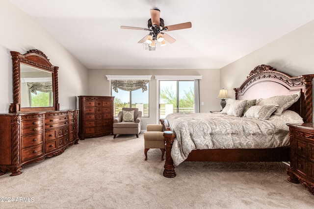 carpeted bedroom featuring ceiling fan and access to exterior