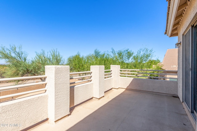 view of patio with a balcony