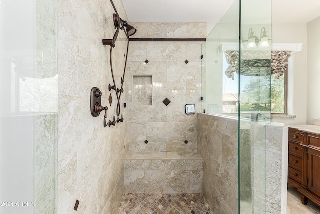 bathroom featuring vanity and walk in shower