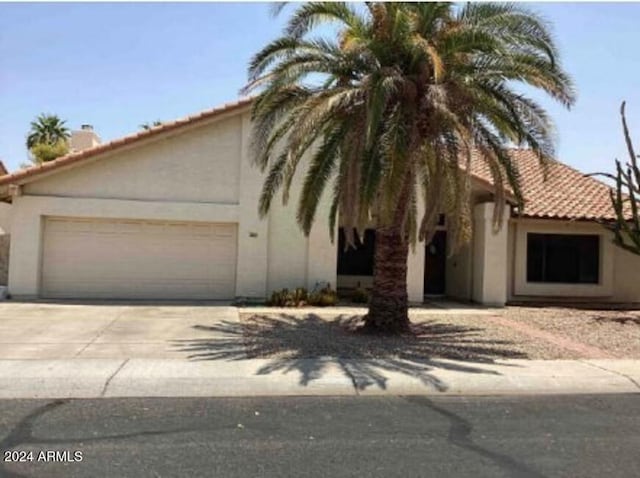 view of front of home with a garage