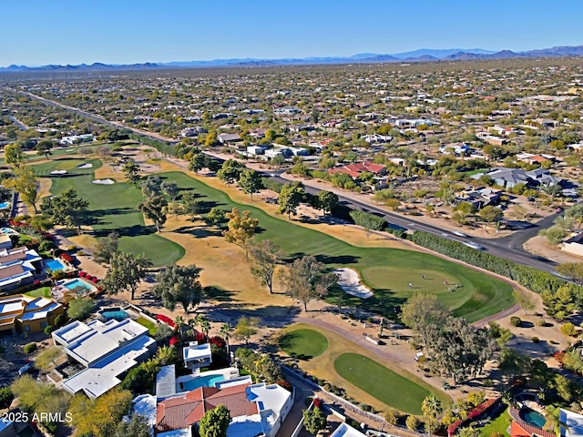 birds eye view of property featuring a mountain view