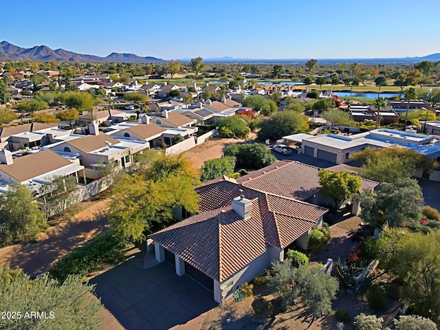 drone / aerial view featuring a mountain view