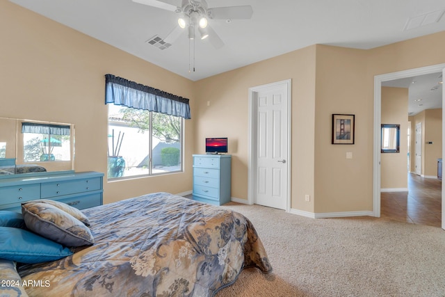 carpeted bedroom with ceiling fan