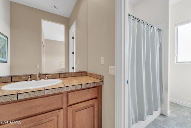 bathroom featuring vanity