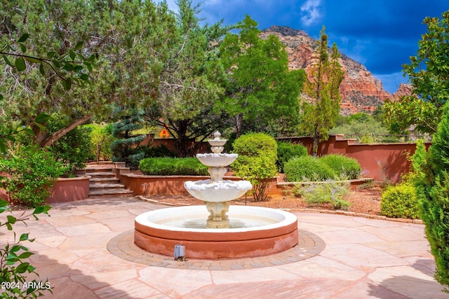 view of patio / terrace with a mountain view