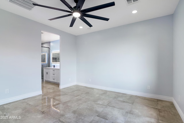 unfurnished bedroom with baseboards, visible vents, connected bathroom, and recessed lighting