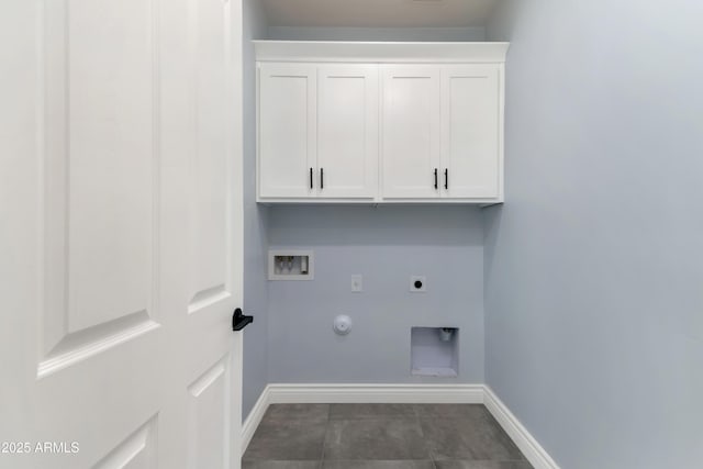 washroom with washer hookup, hookup for a gas dryer, cabinet space, electric dryer hookup, and baseboards