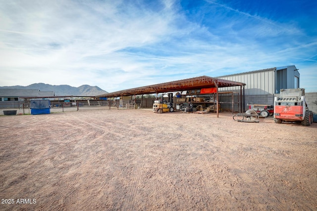 exterior space featuring a mountain view