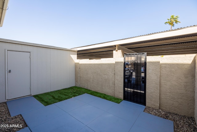 view of patio / terrace with an outdoor structure