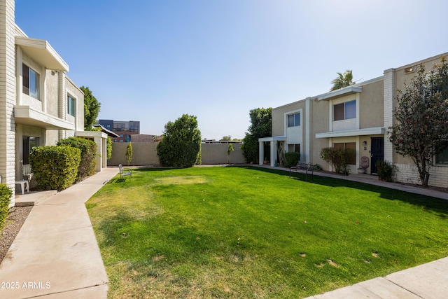 view of yard featuring fence