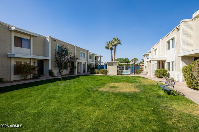 view of yard featuring a residential view