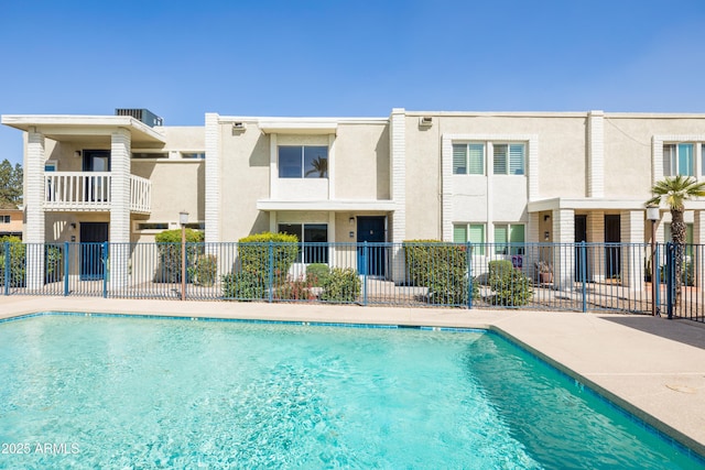 pool featuring fence