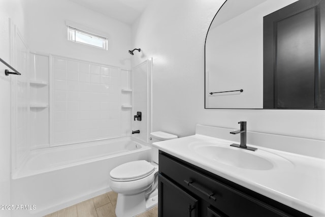 full bathroom featuring vanity, shower / bathing tub combination, hardwood / wood-style floors, and toilet