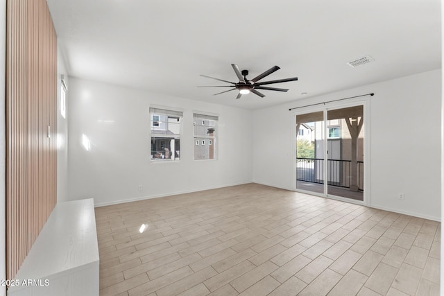 unfurnished room featuring ceiling fan and light hardwood / wood-style floors