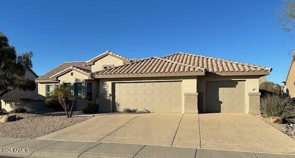 view of front of home with a garage