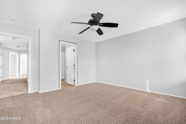 unfurnished bedroom featuring baseboards, carpet, and a ceiling fan