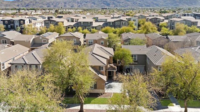 aerial view featuring a mountain view and a residential view