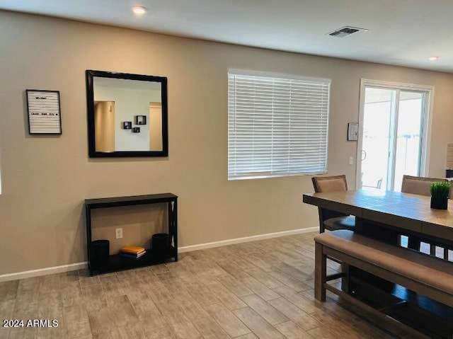 dining room with light hardwood / wood-style flooring