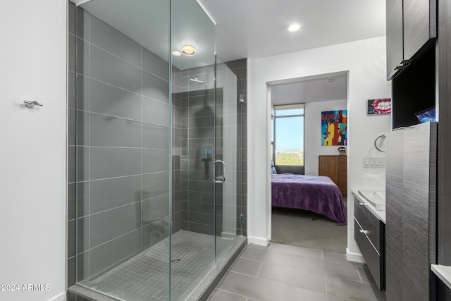 bathroom with tile patterned flooring and an enclosed shower