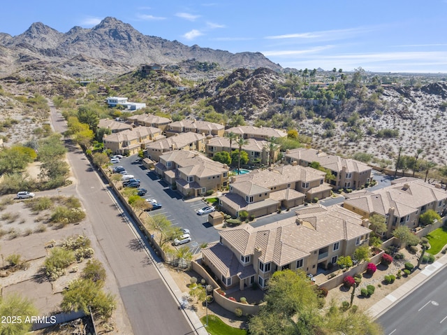 drone / aerial view with a residential view and a mountain view