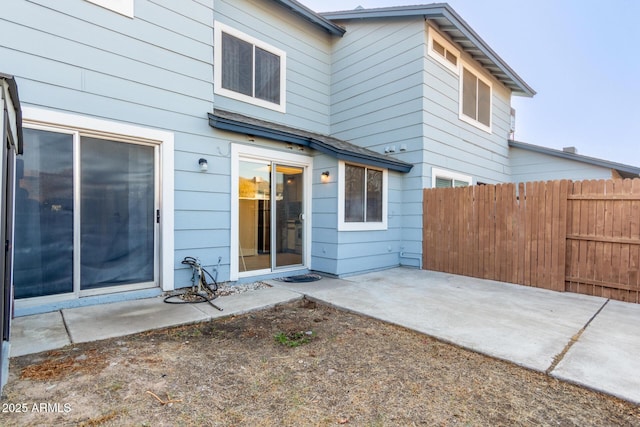 back of house with a patio area