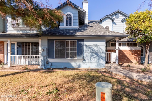 view of front of home with a front lawn