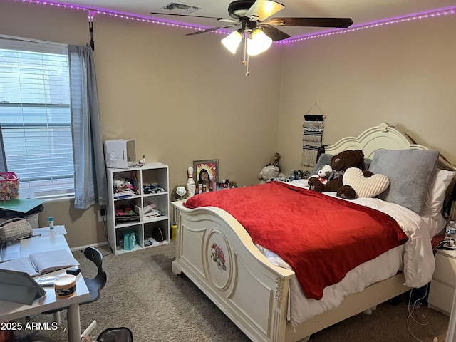 carpeted bedroom featuring ceiling fan